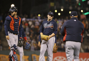Atlanta Braves relief pitcher Brandon Cunniff, center, stands on the mound as manager Fredi Gonzalez, right, comes out to remove him during the eighth inning of the Braves' baseball game against the San Francisco Giants on Thursday, May 28, 2015, in San Francisco. At left is catcher A.J. Pierzynski. (AP Photo/Eric Risberg)