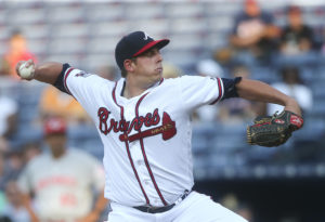 Atlanta Braves starting pitcher Aaron Blair works during the first inning of a baseball game against Cincinnati Reds on Monday, June 13, 2016, in Atlanta. (AP Photo/John Bazemore)
